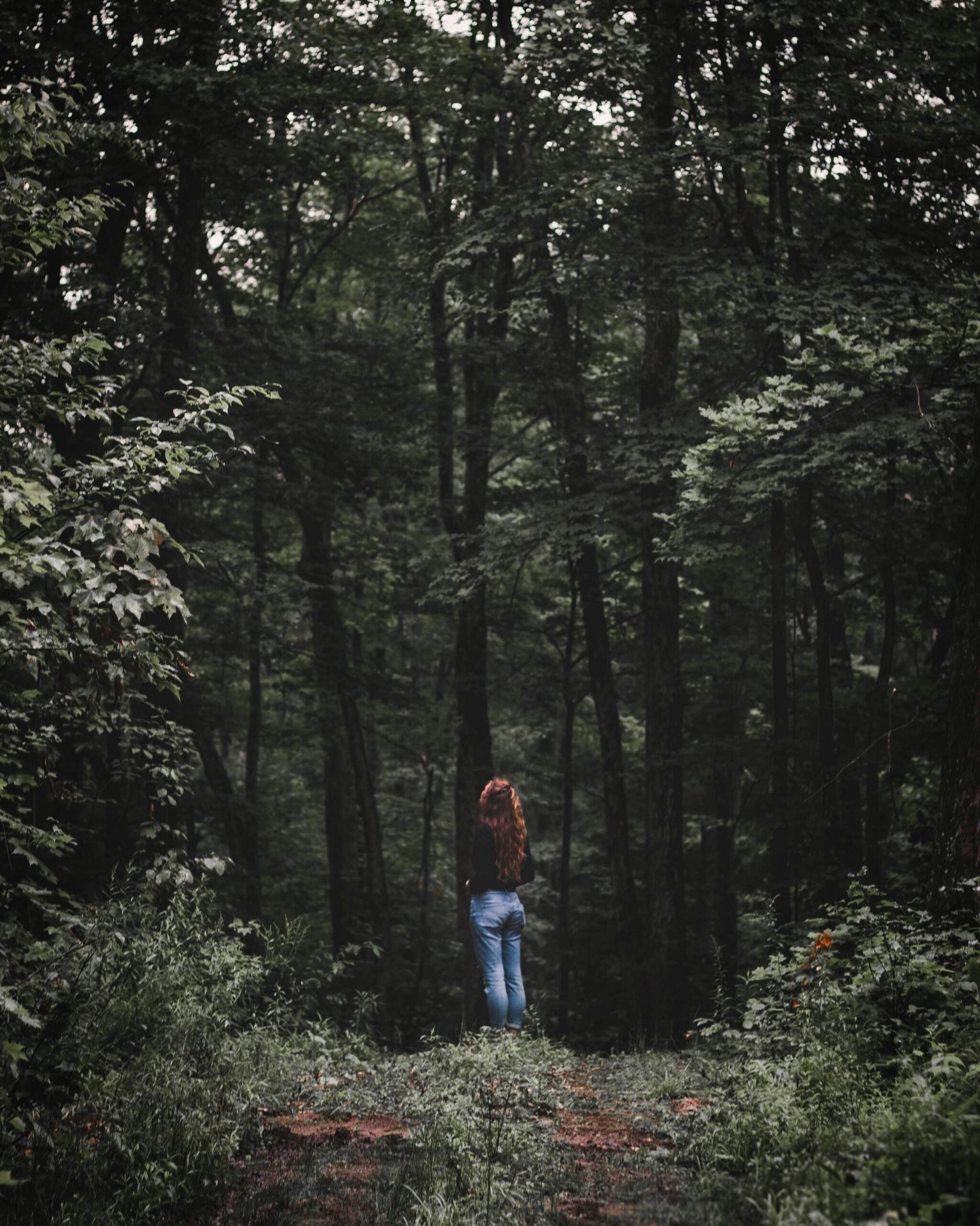 woman walking in woods